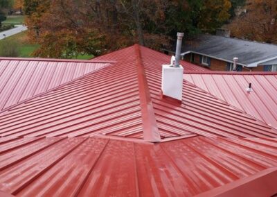 a red roof with a metal roof
