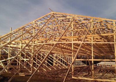 a wooden structure being built with wooden beams